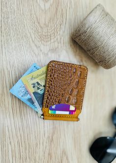 🔸Introducing the Bumble Bee-1 Money Clip Wallet🔸 A vibrant accessory that combines exceptional craftsmanship with striking colors. Designed to stand out, this wallet features a unique color combination and premium materials, making it a perfect choice for those who want to make a statement. 🔸Crafted with Innovative Technology: 🔸 The Bumble Bee-1 showcases outer pockets made from premium cow leather, embossed to replicate the luxurious texture of crocodile skin. The striking mustard color add Leather Crocodile Pattern Card Holder For Everyday Use, Yellow Coin Purse With Card Slots As Gift, Brown Card Holder With Coin Pocket For Gift, Brown Card Holder With Coin Pocket As Gift, Embossed Brown Wallets As Gift, Gift Brown Wallet With Coin Pocket, Brown Card Holder With Coin Pocket, Perfect As Gift, Crocodile Pattern Bifold Wallet As A Gift, Bifold Wallet With Crocodile Pattern For Gift