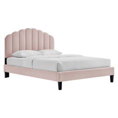 a bed with a pink headboard and white sheets on it's sides, in front of a white background