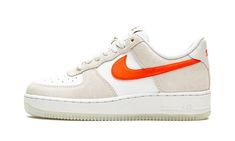 The Women’s Nike Air Force 1 Low SE “First Use” shows respect to the brand’s iconic Swoosh logo with unique, vintage-inspired branding.  A June 2021 release by Nike, this women’s edition of the former basketball shoe references the famous Nike logo with special “First Use June 18, 1971” text below a white outline Swoosh on both sides.  More “1971” detailing also appears on the insoles and a decidedly retro orange “Nike” logo is embroidered onto the heel.  A classic “Nike” insignia with an orange Shoe References, Womens Air Force 1, Orange Sneakers, Air Force 1 High, Nike Air Force 1 Low, Stadium Goods, Swoosh Logo, Nike Womens, Air Force 1 Low