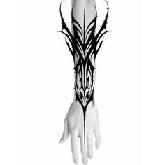 a black and white photo of a hand with an intricate design on the arm,