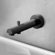 a black and white photo of a faucet on the wall above a sink