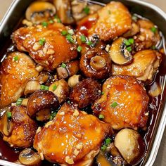 chicken with mushrooms and sauce in a pan