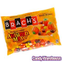 a bag of orange and yellow candy with the words brach's on it