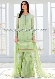 Punjabi light green georgette with embroidery work sharara salwar suit embellished with resham, zari, stone, sequins and patch border work. Comes with matching bottom as sharara/gharara and georette dupatta. Green Sharara, Green Suit, Salwar Suit, Jodhpur, Churidar