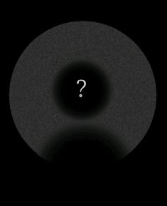 a black circle with a question mark on it in the middle, and a white dot at the center