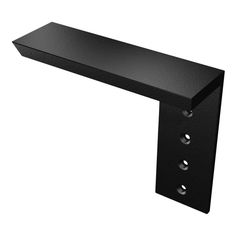 a black shelf with three holes on it