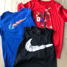 2 Size Large Nike Tee Shirts, Red One Is Dry Fit. Black Nike Tank Top Size Medium Dry Fit. All Like New Condition. Tank Never Worn. Smoke Free Pet Free Home. Fun Red Top For Playwear, Fun Red Tops For Playwear, Nike Red Sporty Tops, Nike Sporty Red Top, Red Graphic Print T-shirt For Playwear, Nike Sporty Tops For Playwear, Sporty Nike Top For Playwear, Red Nike T-shirt For Summer, Nike Red T-shirt For Summer