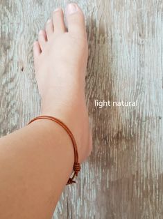 "This simple unisex adjustable leather anklet are made of 2mm genuine leather cord. Sliding knot closure. For the ankle: 9\"-12\" (23cm-30.5cm) Or you can order custom length anklet, please leave note what length do you want after ordering. Bracelet: https://www.etsy.com/listing/559107612/set-of-2-leather-cord-simple-leather?ref=shop_home_feat_2 *✈️ Shipping.. The item shipped by registered airmail Thailand Post within 3-5 working days after payment received. **If you will NOT be home to sign fo Adjustable Casual Barefoot Sandals With Round Toe, Casual Adjustable Barefoot Sandals With Round Toe, Casual Adjustable Barefoot Sandals, Adjustable Ankle Wrap Barefoot Sandals As Gift, Casual Adjustable Brown Barefoot Sandals, Leather Anklets, Sliding Knot Closure, Simple Leather, Sliding Knot