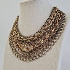 "Statement Necklace, Chunky Antique Gold  Chain Collar Rock Choker Vintage Gold Statement Multi Layered Necklace ----------------------------------------------------------------------------------------- A showstopping mixed metal necklace rich in texture, detail, and totally modern, vintage chic!  This unique statement necklace combines 9  different strands of chains that vary in link style, size, metal finish, and gold tones. From gorgeous Antique Gold to lustrous gold and darker antique gold t Chunky Chain Link Necklace In Costume Jewelry, Multi-strand Chunky Chain Necklace, Costume Jewelry Chain Necklace With Chunky Chain Link, Chunky Chain Link Necklace Costume Jewelry, Bohemian Metal Chunky Chain Necklace, Multi Layered Necklace, Unique Statement Necklace, Chunky Choker, Statement Collar