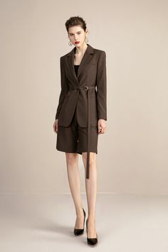 Stylishly fall unique Brown V-Neck Belted Blazer and Short. A style perfect for a cool evening fall walk. Peak lapels; front button blazer V-Neck, Long sleeves; button cuffs. Structured shoulders. Chest welt pockets. Hip flap pockets Polyester 80% Viscose 17% Spandex 3% Imported Brand - Aision Model Number - 213110C1 THIS SET RUNS SMALL Luxury Fall Blazer With Belted Cuffs, Luxury Fall Blazer Dress With Pockets, Luxury Casual Blazer With Lapel Collar, Luxury Brown Tops With Lapel Collar, Cheap Tailored Blazer With Pockets, Luxury Short Sleeve Blazer For Workwear, Luxury Lapel Collar Blazer For Office, Luxury Blazer Dress For Workwear With Button Cuffs, Winter Blazer With Button Closure