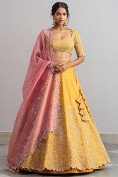 Featuring a mustard lehenga in organza base with cutdana cutwork. It is paired with a matching blouse and a pink dupatta.  FIT: Fitted at bust and waist. COMPOSITION: Organza. CARE: Dry clean only. Blouse Lehenga, Haldi Outfits, Haldi Outfit, Anushree Reddy, Organza Lehenga, Yellow Lehenga, Gaun Fashion, Half Saree Designs, Lehenga Choli Online