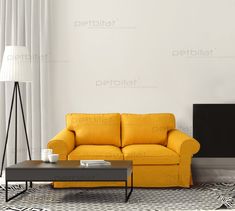 a living room with a yellow couch and black coffee table in front of a white wall