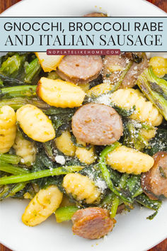 a white plate topped with sausage and broccoli