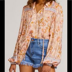 Pretty Orange & Pink Flower Print Top. Long Elastic Cuffed Sleeves, V-Neck That Ties. 65% Polyester And 35% Cotton. Feminine Pink Tie Neck Top, Pink Feminine Tie Neck Top, Pink Flower Print, Flower Print Top, Pretty Orange, Women Floral Blouse, Boho Fashion Summer, Floral Print Tunic, Boho Boutique