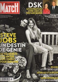 a magazine cover with two people sitting on a bench