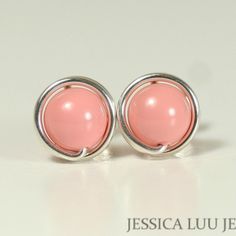 Sterling Silver Pink Coral Pearl Earrings Handmade by Jessica Luu Jewelry  ~ Petite ~ Timeless ~ Simple ~ Perfect for everyday wear, these small studs add a touch of casual elegance to every occasion. MATCHING ITEMS https://www.etsy.com/shop/JessicaLuuJewelry?search_query=pink+coral+pearl MATERIALS: ~ 6mm pink coral crystal nacre pearls ~ Sterling silver or 14K gold filled wire ~ Ear backings ~ Sold per pair HOW THEY'RE MADE: Each pearl is wrapped by hand with 14K gold filled wire which is then Handmade Round Coral Jewelry, Pink Pearl Earrings With Round Ear Wire, Handmade Coral Round Jewelry, Pink Pearl Round Earrings, Coral Stud Earrings, Pearl Earrings Handmade, Coral Crystal, Pink Coral, Small Earrings