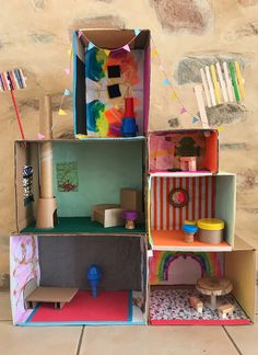 a doll house made out of cardboard boxes