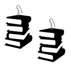 two black books stacked on top of each other with silver earwires hanging from them