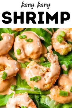 a plate full of shrimp covered in sauce and garnished with green onions