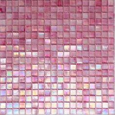 a close up view of a pink mosaic tile wall