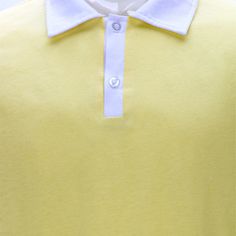 a yellow polo shirt with white collar and two buttons on the left side of the chest