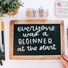 a chalkboard with the words everyone was a beginner at the start