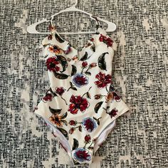 One Piece Bathing Suit. Cream Color With Mix Of Red Blue And Orange Flowers. New With Tags Casual Patterned Swimwear For Spring, Multicolor Floral Print Swimwear For Day Out, White Floral Print Swimwear For Day Out, Casual White Lined Swimwear, One Piece Bathing Suit, Swim Wear, One Piece Swim, Blue And Orange, Orange Flowers