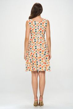 Embrace the warmth of summer in our vintage style Leaf Polka Dot Dress! Made with 100% cotton, this sleeveless midi dress features pockets, a flattering v-neckline and a stylish cross over detail in the front. The flattering fit and flare style will have you feeling confident and chic. Perfect for any summer occasion! Denim Jacket With Dress, Kimono Duster, Feeling Confident, Sleeveless Midi Dress, Tunic Sweater, Midi Dress Sleeveless, Jean Leggings, Polka Dot Dress, Sweater Coats