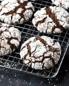 chocolate crinkle cookies cooling on a rack with the words cool whip cookies below