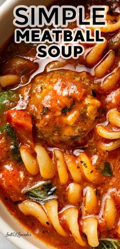 a white bowl filled with pasta and meatballs