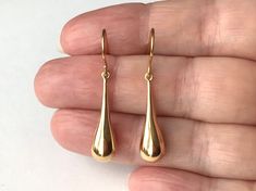 18ct Gold over Sterling Silver Long Teardrop Earrings dimensions: 7mm wide x 35mm drop material: 18ct Gold over Sterling Silver. Elegant Pierced Teardrop Earrings, Formal Pear-shaped Drop Earrings With Matching Set, Formal Hypoallergenic Long Drop Jewelry, Classic Polished Drop Earrings, Teardrop Drop Earrings For Formal Occasions, Formal Teardrop Pierced Drop Earrings, Formal Teardrop Shaped Pierced Earrings, Gift Shiny Finish Teardrop Earrings, Formal Dangle Drop Earrings With Matching Set