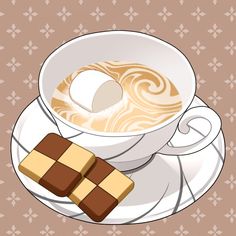 a cup of coffee and two pieces of chocolate on a saucer