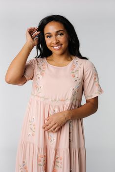 Lovely floral embroidered dress Lightweight woven Round neckline Short sleeves with embroidery Multiple gathered tiers Side pockets Lined Fabric content - Rayon - Hand wash recommended Spring Dress With Embroidered Hem, Cheap Cotton Embroidered Dress With Short Sleeves, Cheap Casual Embroidered Dress, Spring Embroidered Cotton Dress, Cheap Casual Cotton Embroidered Dress, Casual Dresses With Embroidered Hem, Grandma Dress, Knit Fabric Dress, Dusky Skin