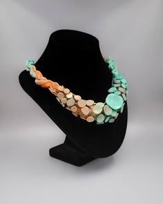 "Chunky Necklace, Long Big Bold Bohemian Statement Bib Fabric Necklace, Avant-Garde Shibori Jewelry, Anniversary Birthday Valentines Gift for Wife Mom Sister Best Friend This flamboyant fabric necklace is made of soft and lightweight satin fabric, in gentle and bright colors of dawn - light shades of turquoise and orange degrade. This big bold bib necklace is outstanding and unique. It's the perfect wearable art accessory for creating an impressive appearance. Fungi jewelry is a whimsical and pe Unique Multi-strand Necklace With Variations, Handmade Long Costume Jewelry Necklace, Unique Multi-strand Beach Necklaces, Unique Multi-strand Necklace For Beach, Bold Bohemian, Shibori Scarf, Necklace Fabric, Shibori Jewelry, Avant Garde Jewelry