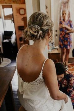 the bride is getting ready to walk down the aisle