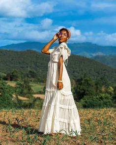 Flowy Bohemian Boho Dress With Ruffles, Flowy Bohemian Dress With Ruffles, White Flowy Bohemian Maxi Dress, Long Beige Boho Dress For Vacation, Beige Long Boho Dress For Vacation, Beige Boho Dress With Ruffles For Beach, Cream Maxi Dress For Spring Festival, Long Cotton Bohemian Dress, White Bohemian Cotton Peasant Dress