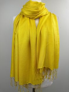 "This is a light weight all season wool shawl. This versatile shawl can be used to dress up an outfit for a special evening, as wedding favors, travel wrap or as a neck scarf in the winter. Easy to carry anywhere, perfect for when you need it at a restaurant or at the office in air conditioning or a cool summer evening. Effortlessly give a dress a new look by simply adding this shawl. A must have when you travel! Measures 26\"Wide x 74\"Long COLOR MATCHING/ACURACY The color is very close however is not exact, I tried to to capture the colour as acurately as possible but was not able to get the exact colour under any lighting.  In the pictures I have posted sometimes one picture looks like its a slighty different shade than others, please mention the specific color/picture you are intereste Winter Gift Silk Shawl Scarf, Solid Color Shawl Scarf One Size, Solid Color Pashmina Shawl, Formal Shawl, Travel Wrap, Wool Shawl, Cool Summer, Yellow Light, Neck Scarf