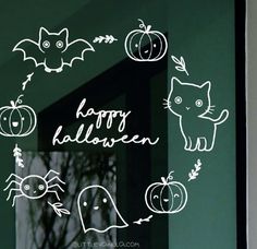 a window with halloween stickers on it