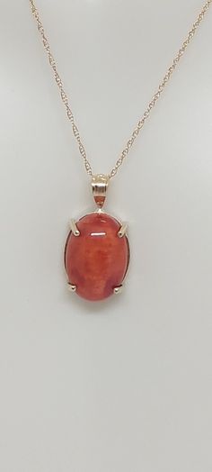 RED CORAL Oval Pendant 14k Yellow Gold/ Necklace /Charm in 14k Yellow Gold 18 Inches ROPE Chain for a Red Coral LOVER. Product Info: -Stone: Oval Red Coral. -Stone Color: Red. -Metal: 14k Yellow Gold. -Pendant Measures: 18 x 10mm. -Red Coral Measures: 12 x 9mm -Chain length: 18 Inches ROPE chain. -Nice Gift Box Included. Luxury Red Pearl Pendant Necklace, Luxury Red Oval Pendant Jewelry, Oval Yellow Gold Jewelry With High Luster, Oval Yellow Gold High Luster Jewelry, 14k Gold Orange Jewelry With Polished Finish, 14k Gold Oval Cabochon Jewelry, Orange 14k Gold Jewelry With Polished Finish, 14k Gold Oval Jewelry With Polished Finish, Oval 14k Gold Jewelry With Polished Finish