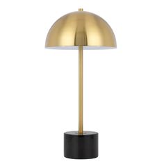 a black and gold lamp on a white background