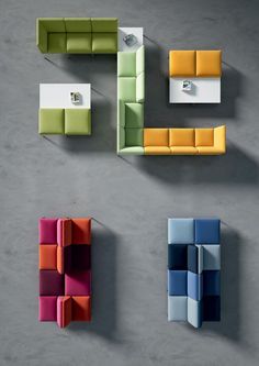 four different colored couches are arranged in the same pattern and color as they appear to be made out of concrete