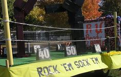 the rock'em sock fm sign is on display in front of a fenced off area