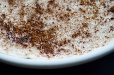 a white plate topped with lots of brown stuff