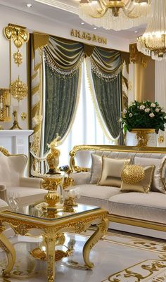 a fancy living room with gold accents and chandelier