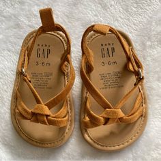 Gap Baby Sandals. Size 3-6 Months. Brown/Tan Baby Sandals. Velcro Straps. Excellent Condition. New Without Tags. Never Worn. Brown Sandals With Soft Sole For Beach, Brown Beach Sandals With Soft Sole, Brown Sandals For Playtime In Spring, Casual Brown Sandals For Playtime, Gap Sandals With Round Toe For Spring, Cute Brown Sandals For Spring, Cute Brown Summer Sandals, Gap Open Toe Sandals For Spring, Gap Adjustable Open Toe Sandals