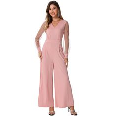 Are you tired of blending in with the crowd at parties and in the office? Do you want to make a statement and show off your feminine charm? Look no further than this solid color jumpsuit! This jumpsuit is the perfect choice for any occasion, whether you're looking to impress at a formal event or turn heads at a party. Its sleek and stylish design is sure to make you stand out from the crowd! But this jumpsuit isn't just for special occasions - it's also great for everyday wear. Whether you're ru Summer Jumpsuit Casual, Palazzo Jumpsuit, Tube Jumpsuit, Maxi Jumpsuit, Solid Color Jumpsuits, Wide Leg Romper, Belt Jumpsuit, Leg Belt, Pink Jumpsuit