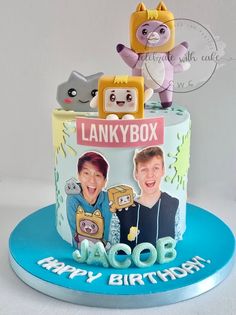 a birthday cake with an image of two people on it and the name lankybox