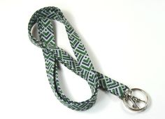 This cute lanyard has beautiful green geometric design. This lanyard is very beautiful in person. You can have a wardrobe of lanyard to match your outfit. This lanyard is made of soft 100% cotton fabric to give a comfortable feel around your neck. This lanyard is easy to take care. You can spot clean and throw in a washer and hang dry. If you want you can iron and it is ready to use. These lanyards are perfect if you have metal allergy. Each of these lanyards will have a slight different pattern Cute Lanyard, Cute Lanyards, Patriotic Fabric, Fabric Lanyard, Geometric Star, Have Metal, Badge Holder, Diamond Design, Badge Holders Lanyard