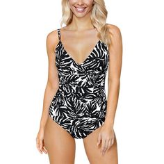 Color/Pattern: Black/White Slip-On Styling This Item Is Lined This Item Has Removable Cups 88% Nylon, 12% Spandex Contrast: 100% Polyester Hand Wash Imported Black Tropical Printed Swimwear, Black Printed Tropical Swimwear, Black Tropical Printed Tankini, Tropical Black V-neck Swimwear, White V-neck Tankini For Vacation, White Printed V-neck Swimwear, White V-neck Tankini For Summer, White V-neck Tropical Swimwear, White V-neck Summer Tankini