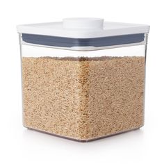 a glass container filled with brown rice